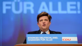 Aufregung um den Arbeiter im Hintergrund