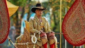 Auf einer Sänfte durch Bangkok getragen