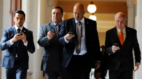 Vier Mann in einem Boot