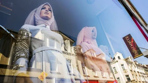 Zerrieben zwischen zwei Kulturen