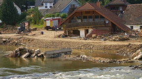 Menschen in Flutregion bereiten sich auf neuen Regen vor