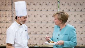 Merkel besichtigt den „Aufbau West“ in China