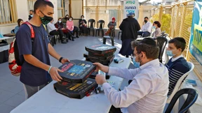 Pizza als Belohnung für Corona-Impfung