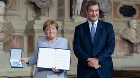 Eine Ehrung, die Merkel nicht in die Wiege gelegt war