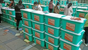 Eine chinesische Stadt probt die Öffnung