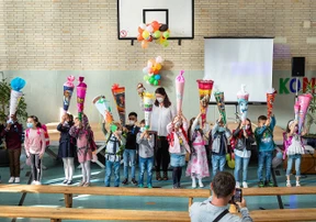 Einschulung mit Testheft und Faultier