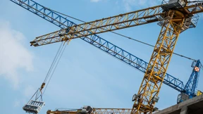 Ausländische Bauarbeiter besetzen stundenlang Baukran