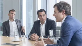 Drei Mann, sieben Milliarden Euro