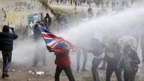 Aktivisten verbünden sich mit Flüchtlingen bei Demonstration