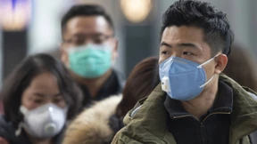 China gehen die Mundschutzmasken aus