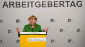 Merkel nimmt Firmen bei Ökostrom-Kosten in die Pflicht