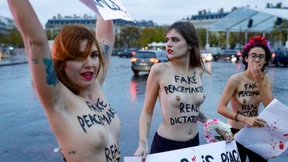Femen-Aktivistinnen protestieren gegen „Kriegsverbrecher“