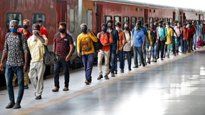 Indiens Wanderarbeiter kehren an den Arbeitsplatz zurück