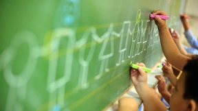 Grundschüler im Süden rechnen und lesen besser