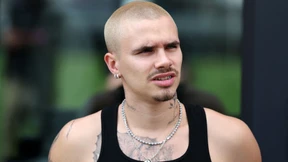 Romeo Beckham steht hinter seinen Eltern