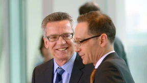 De Maizière und Maas wollen öffentlichen Streit vermeiden 
