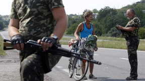 Merkel fordert Putin auf, Einfluss auf Separatisten geltend zu machen