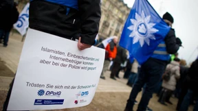 Beamte protestieren gegen Einsparungen