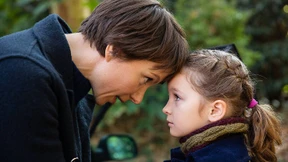 Vater, Mutter, hin- und hergerissenes Kind