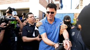 Funktionär in Handschellen