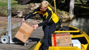 Gewinn der Post bricht um mehr als 50 Prozent ein