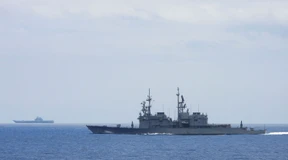 Peking lockt und droht