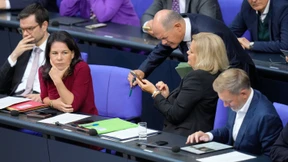 Sie klammern sich an Merkels „Wir schaffen das“