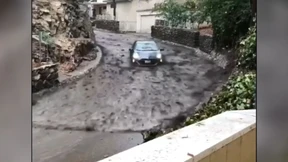 Schlammlawine reißt Auto mit