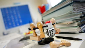 Unternehmer im Schwitzkasten