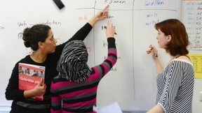 Zufriedene Migranten, muffelige Deutsche