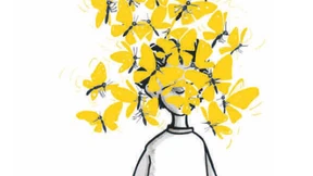 Er kauert am Bett, seine Augen leuchten