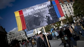 Beiden Seiten gelten sie als Agenten