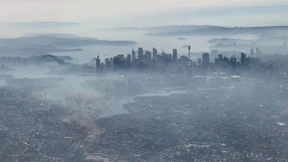 Sydney in dichte Rauchwolken gehüllt