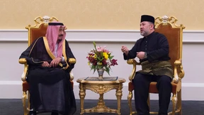 Der König auf Geschäftsreise in Asien