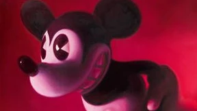 Micky Mouse grinst von der Wand