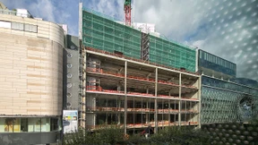 Unten shoppen, oben coworken