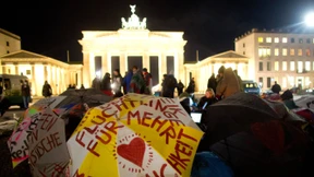 Auf dem Rücken der Asylbewerber