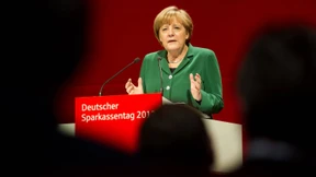 Merkel: Für Deutschland müssten Zinsen höher sein