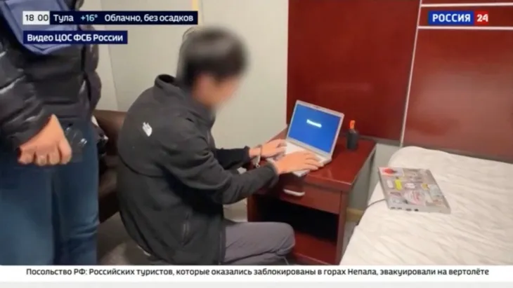 Aus dem FSB-Video: Der japanische Korrespondent muss offenbar seinen Computer entsperren.