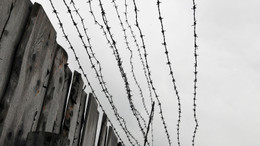 Frei waren hier nur die Gedanken: Holzbretterzaun und Stacheldraht am ehemaligen Straflager Perm 36, heute Gulag-Museum