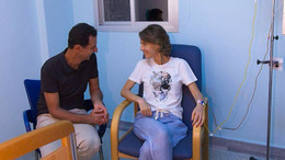 Sie gucken sich verliebt an: Das von dem syrischen Präsidialamt zur Verfügung gestellte Foto, zeigt die kranke Präsidentengattin. 