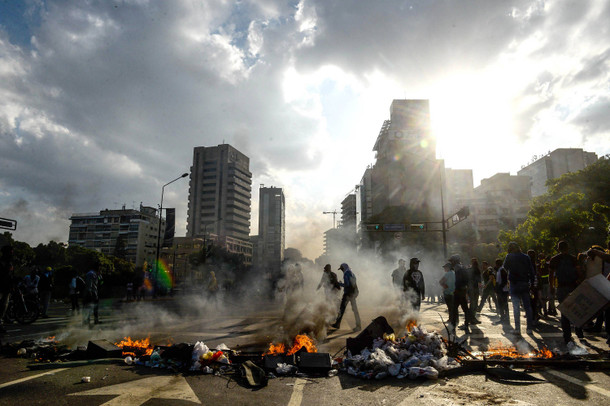 In Caracas spielten sich am Samstag (Ortszeit) chaotische Szenen ab. In Caracas spielten sich am Samstag (Ortszeit) chaotische Szenen ab.