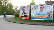 Wahlplakate mit den Spitzenkandidaten Kutschaty (SPD, li) und Wüst (CDU)