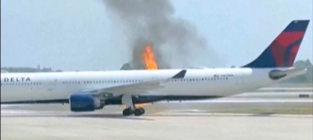 Delta Air Lines aircraft evacuated at Orlando International Airport after engine fire.