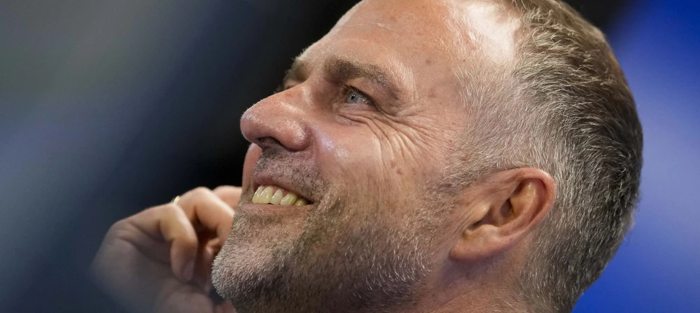 Hansi Flick celebrates a victory with <a href=
