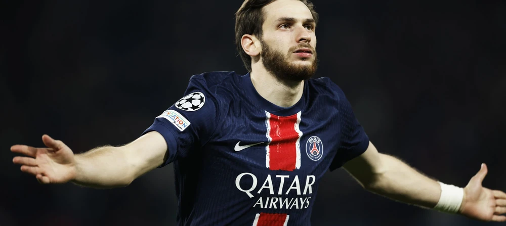 Khvicha Kvaratskhelia celebrates a goal for Paris against Aston Villa.