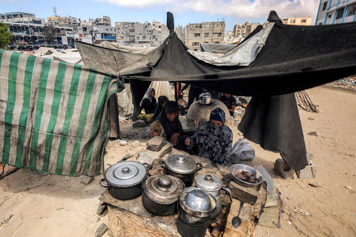 Opfer des Krieges: Palästinensische Frauen kochen im Gazastreifen.