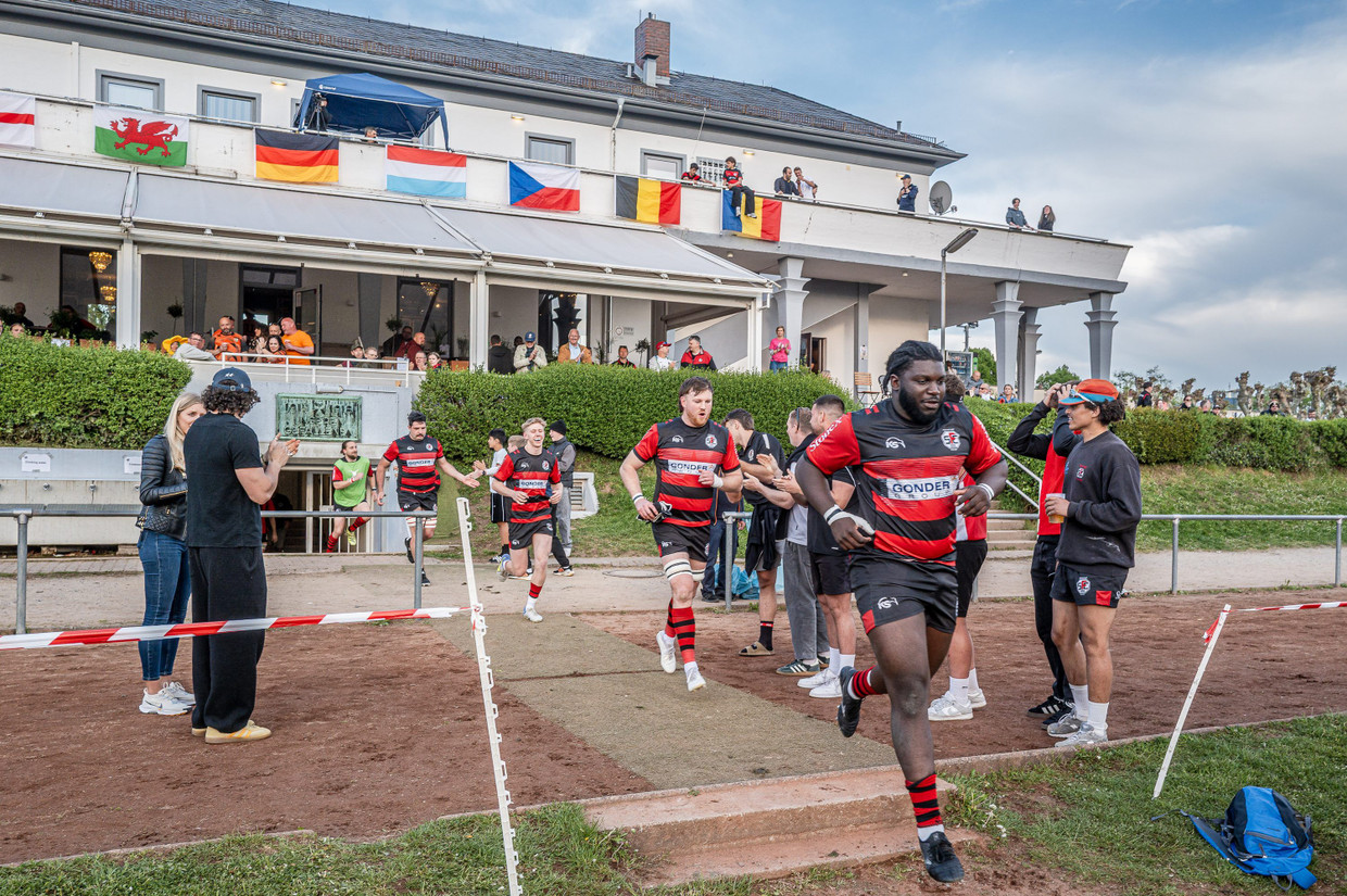Rugby team in action, showcasing teamwork and determination.