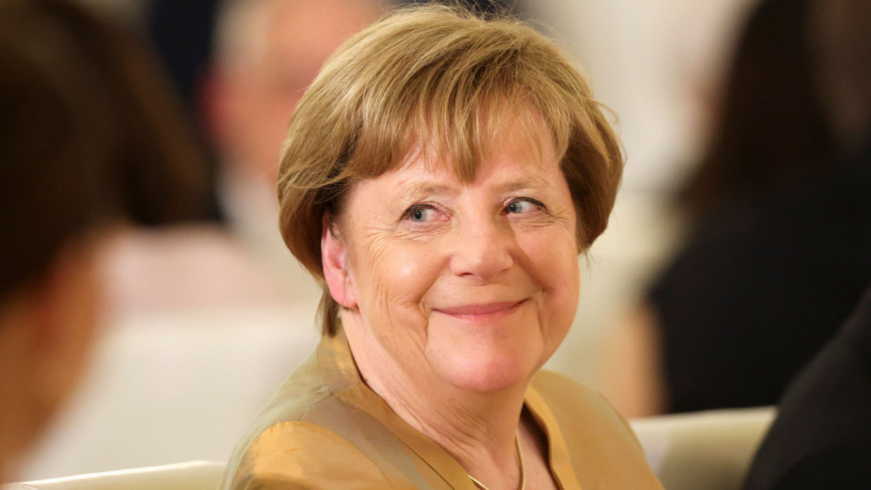 Angela Merkel with the British royal couple at a state banquet at Bellevue Palace in March 2023.