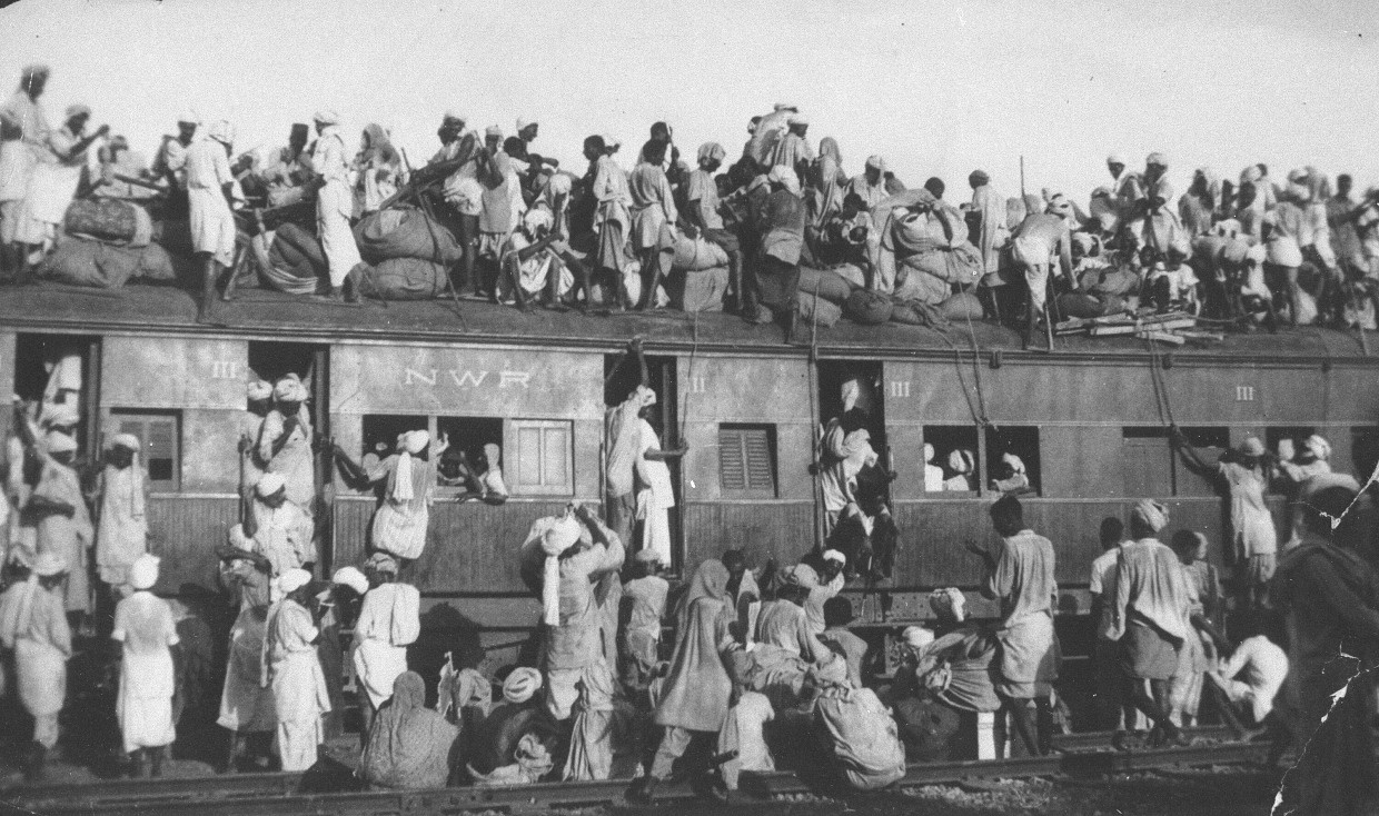 Flucht nach Pakistan: Muslime im Jahr 1947 in und auf einem Eisenbahnwagen in Delhi
